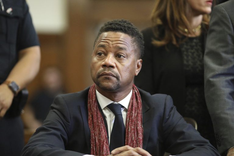 Actor Cuba Gooding Jr. admits to forcibly kissing a waitress.