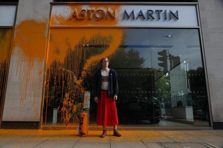 Aston Martin showroom hit as U.K. vows action on climate protests